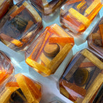 Kingdom Within vegan bar soap by Crystal Bar Studio featuring a tiger's eye crystal, handcrafted 7 oz bar scented in spiced mahogany for strength, grounding, and inner power.