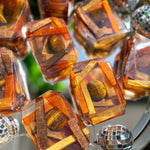 Kingdom Within vegan bar soap by Crystal Bar Studio featuring a tiger's eye crystal, handcrafted 7 oz bar scented in spiced mahogany for strength, grounding, and inner power.