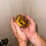 Kingdom Within vegan bar soap by Crystal Bar Studio featuring a tiger's eye crystal, handcrafted 7 oz bar scented in spiced mahogany for strength, grounding, and inner power.