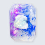 Moon Child soap by Crystal Bar Studio featuring a rainbow moonstone crystal, handcrafted vegan bar soap for spiritual connection and relaxation.