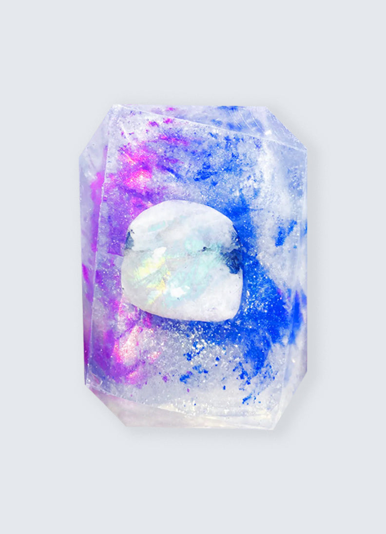 Moon Child soap by Crystal Bar Studio featuring a rainbow moonstone crystal, handcrafted vegan bar soap for spiritual connection and relaxation.