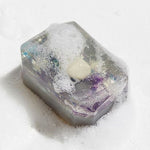 Moon Child soap by Crystal Bar Studio featuring a rainbow moonstone crystal, handcrafted vegan bar soap for spiritual connection and relaxation.