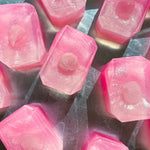 Wild Roses mini vegan soap by Crystal Bar Studio featuring a rose quartz crystal, handcrafted 3 oz bar scented in roses for love, beauty, and self-care.