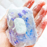 Moon Child soap by Crystal Bar Studio featuring a rainbow moonstone crystal, handcrafted vegan bar soap for spiritual connection and relaxation.