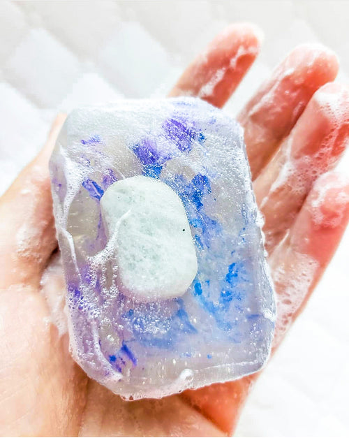 Moon Child soap by Crystal Bar Studio featuring a rainbow moonstone crystal, handcrafted vegan bar soap for spiritual connection and relaxation.